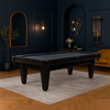 Luxe zwarte pooltafel met blauw speelveld in moderne woonkamer met donkerblauwe muren, messing accenten en okergele fauteuil – Lexor Imperator Competition Black-Oak 6ft